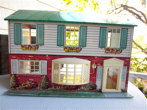 metal doll houses 1960s|vintage tin doll house.